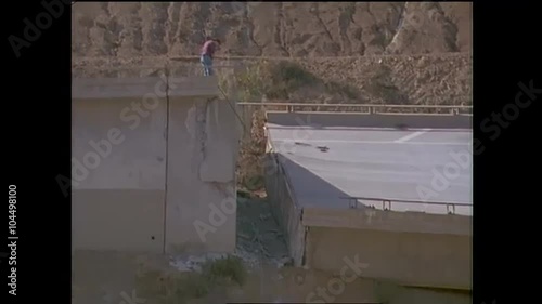 Footage of the 1994 Northridge earthquake freeway collapses.