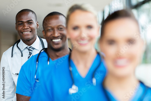 african male doctor standing in a row