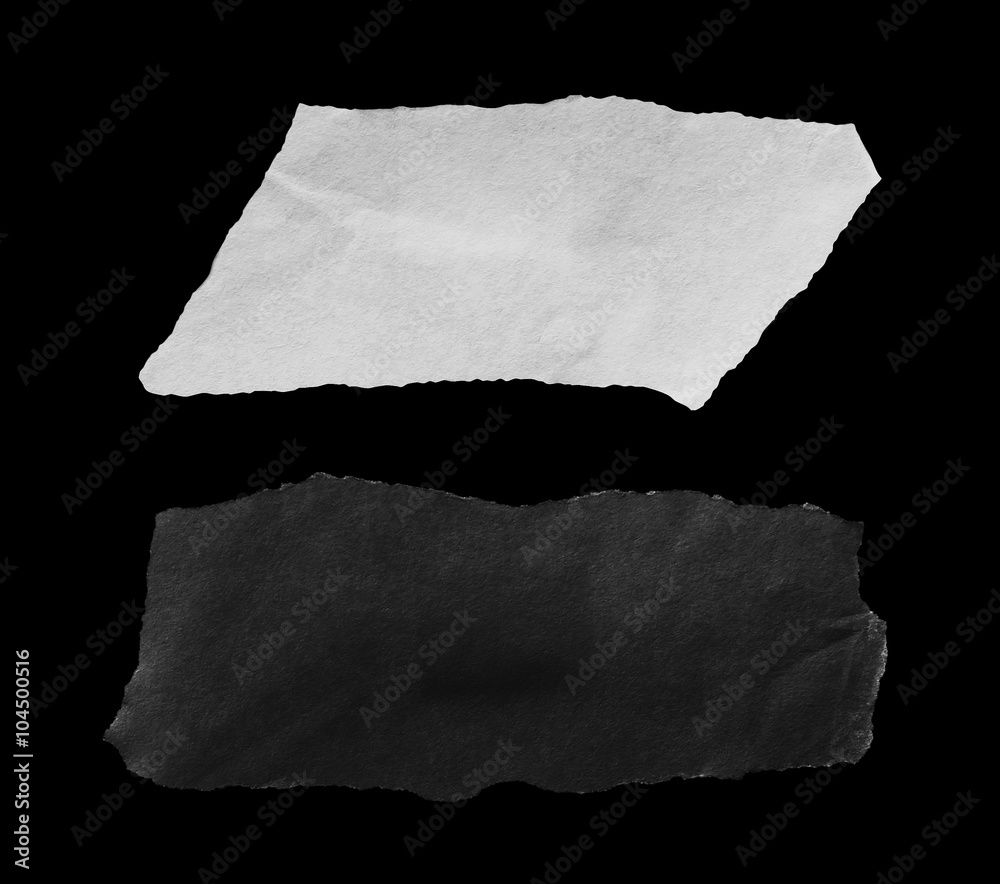 piece of ripped white paper on black background piece of ripped white paper on black background