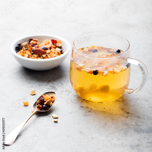 Fruit tea, dried fruits and spices, in cup 