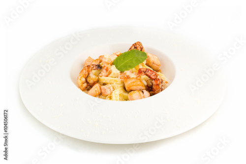 Pasta with salmon fish on white background