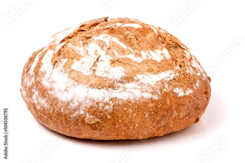 loaf of freshly baked bread floured on white background