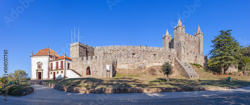 Santa Maria da Feira, Portugal - October, 2015: The Feira Castle with Nossa Senhora da Esperanca Chapel on the left. photo