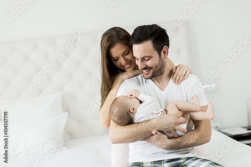 Happy family with newborn baby