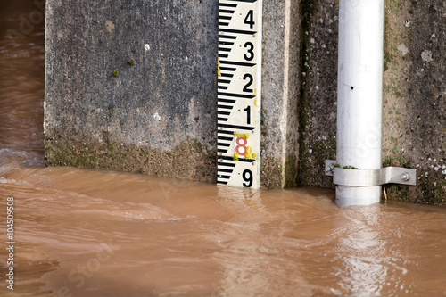 River Level Marker Gauge For Measurement. High Water Levels photo