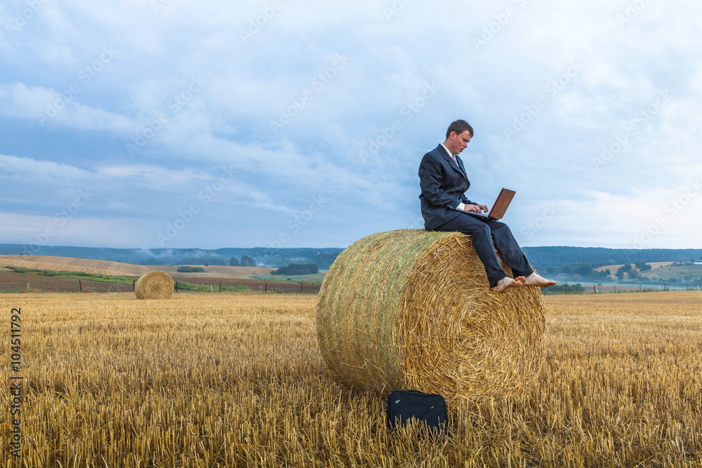 Contemporary businessman farmer in the landscape Contemporary businessman farmer in the landscape