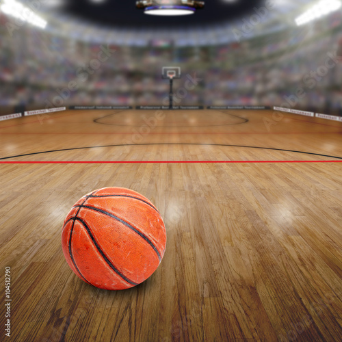 Basketball Arena With Ball on Court and Copy Space. Rendered in Photoshop. © ronniechua