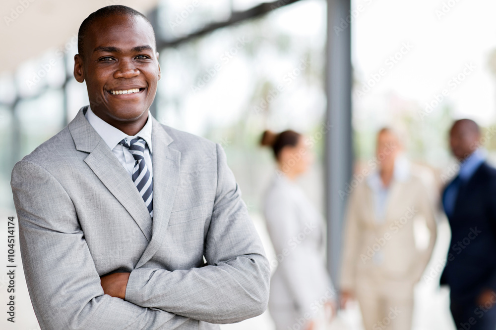 black businessman executive looking at the camera black businessman executive looking at the camera