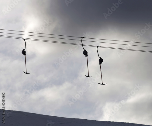 Photography Silhouett of a ski lift and in evenling light