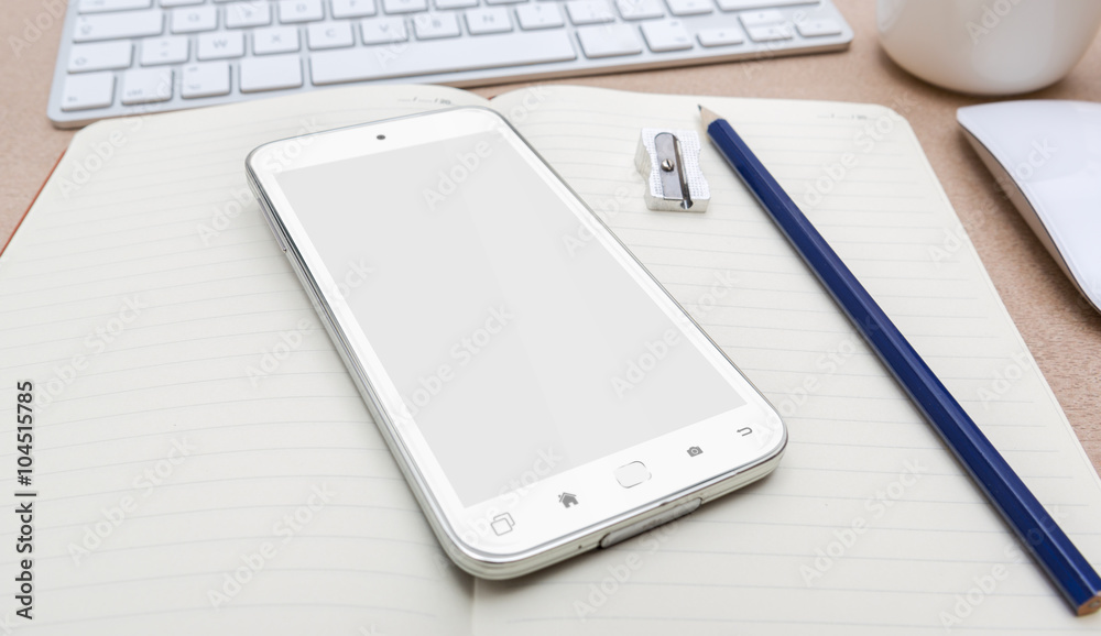 Workplace with modern mobile phone Workplace with modern mobile phone