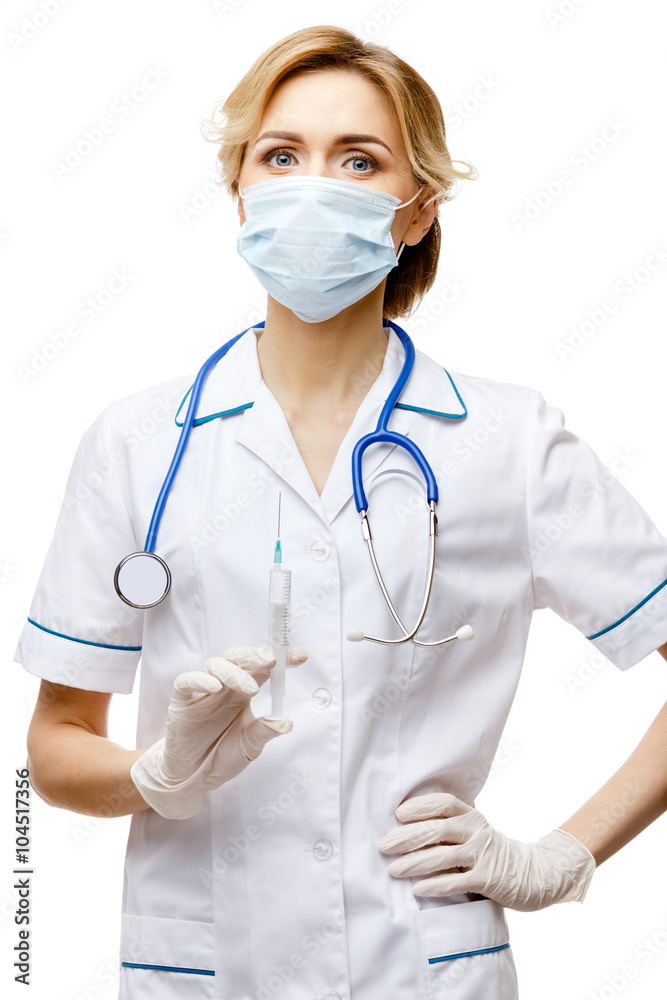Woman doctor standing on white background