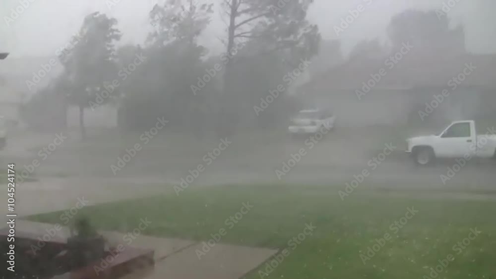 A large storm produces hail and heavy rain. A large storm produces hail and heavy rain.