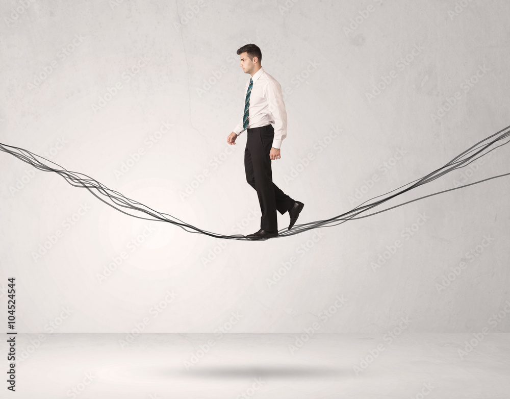 Sales person balancing on drawn ropes Sales person balancing on drawn ropes