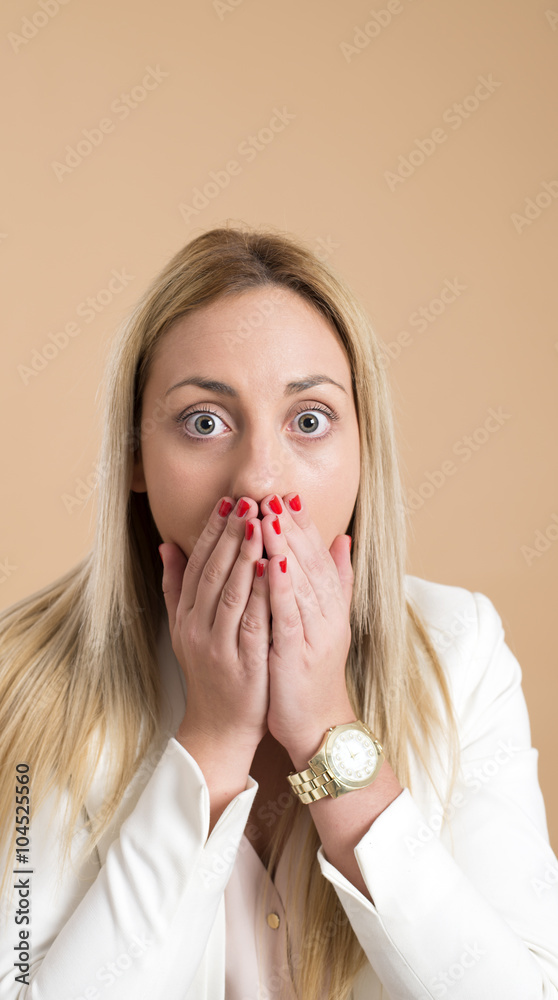 attractive young woman with a look of surprise.
