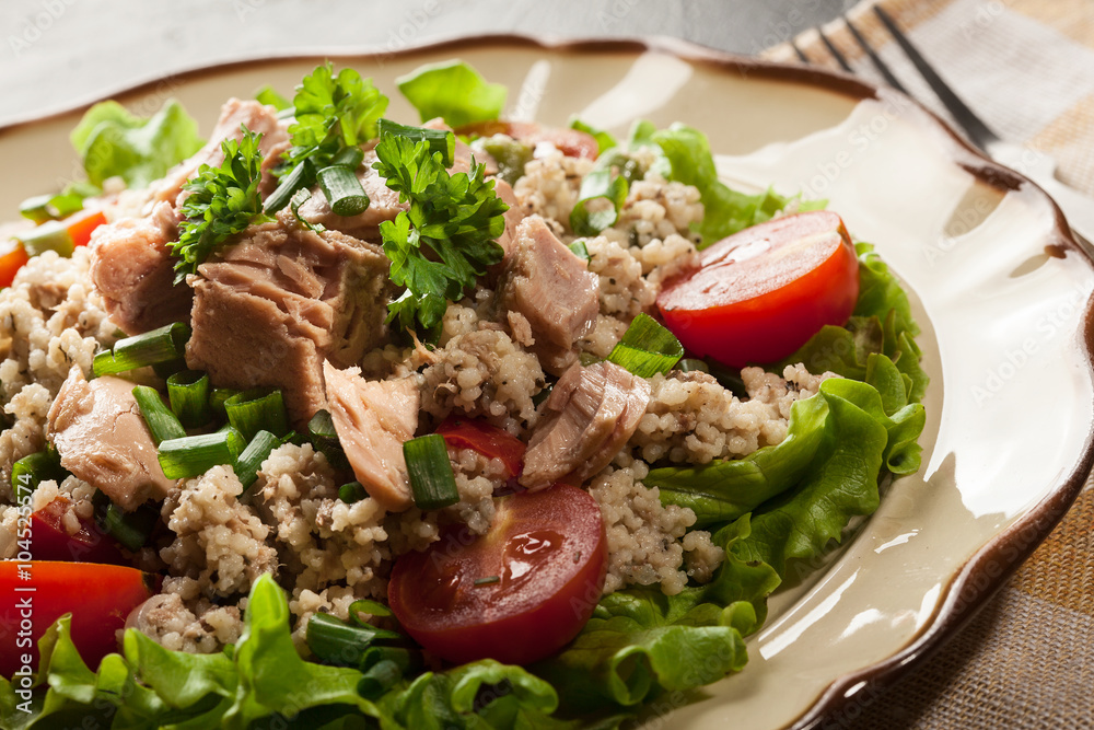 Tasty salad with couscous, tuna and vegetables Tasty salad with couscous, tuna and vegetables