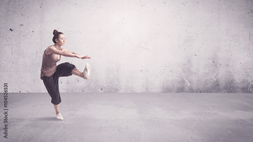 Pretty urban dancer with empty background Pretty urban dancer with empty background