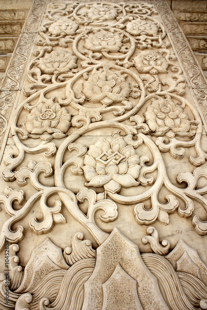 Traditional chinese carved floral pattern with peony on the marble