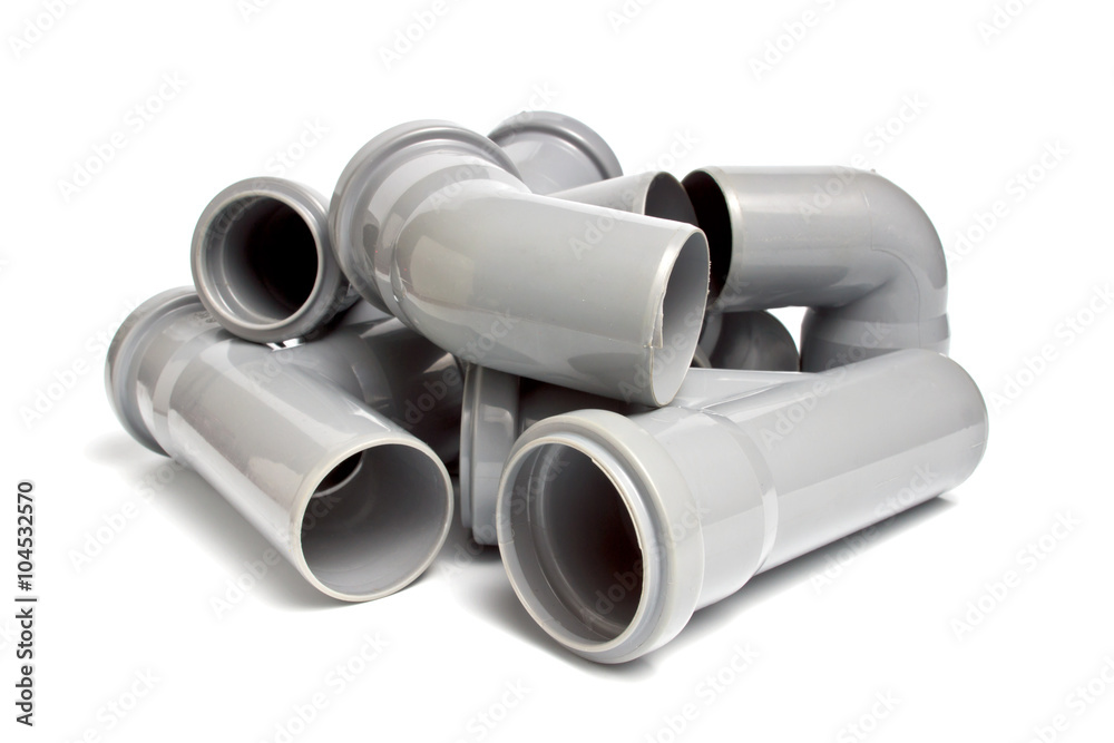Fototapeta premium composition from plastic sewer pipes, isolated on the white