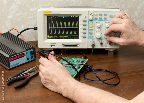 Workplace engineer. Oscilloscope.