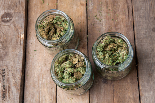 Marijuana buds in glass jars