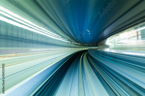 Speedy train moving in tunnel
