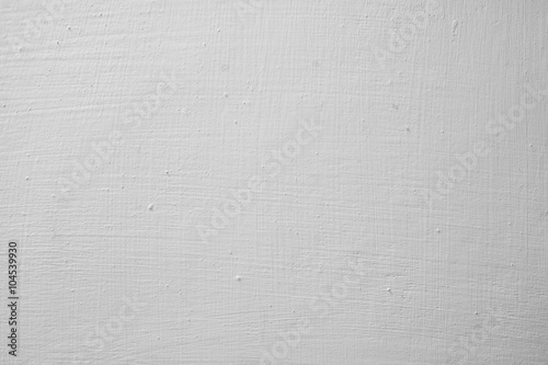 White background of natural cement or stone with spots.