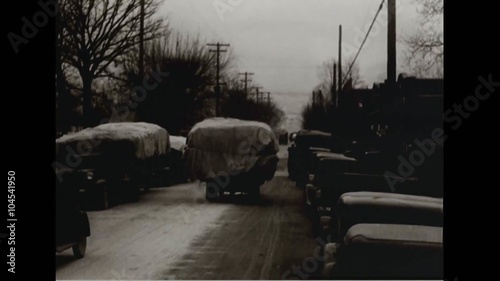 Tobacco is unloaded into a warehouse and is prepared to be sold in 1934 in Kentucky. photo