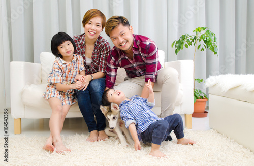 Asian family and pet