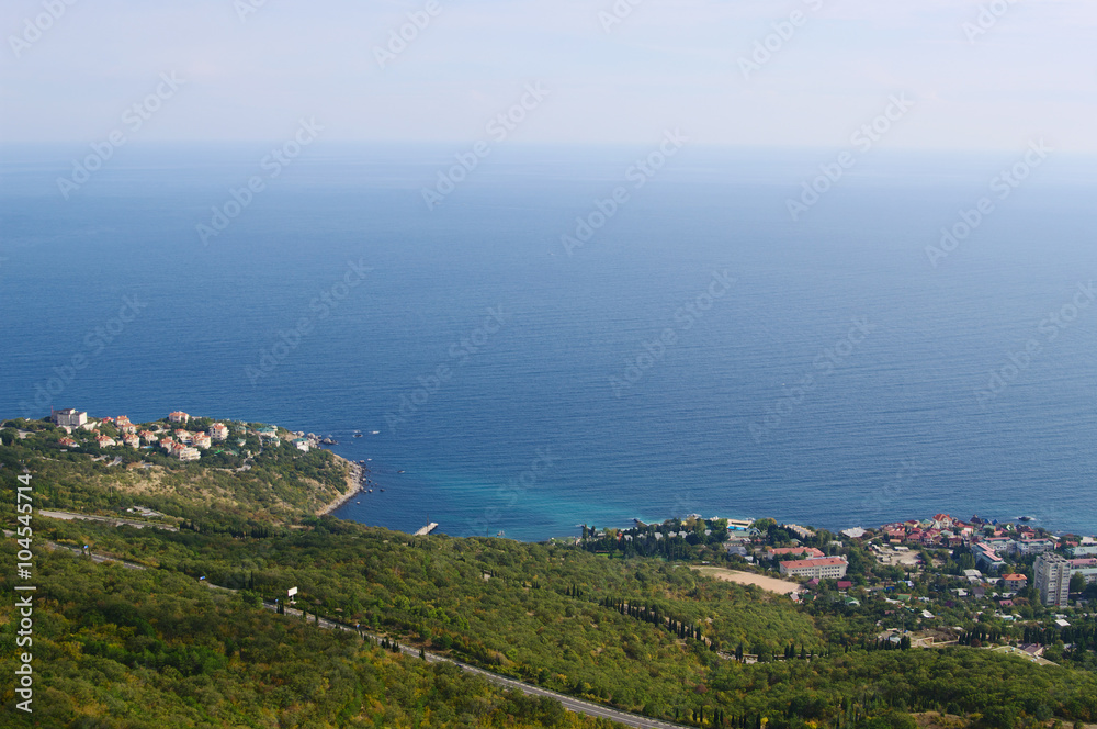 Top view of Black sea coast with townships, Crimea, Russia 