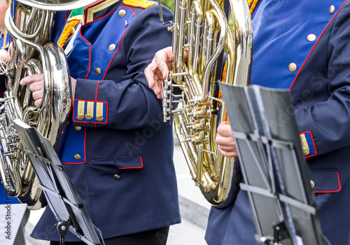 musicians playing tuba in street orchestra