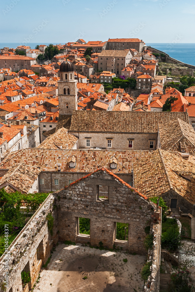 Dubrovnik city view with tower and riuned house
