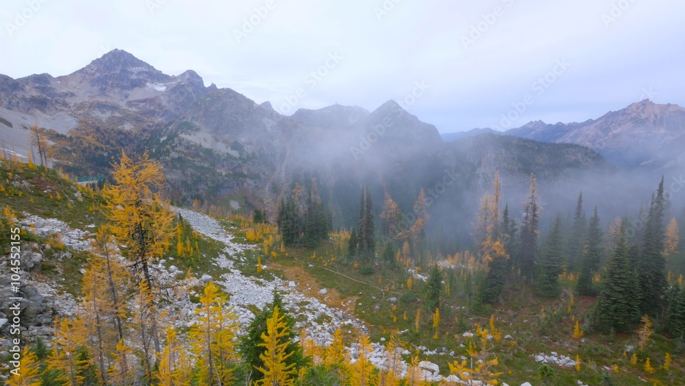 Beautiful rocky mountains. Sharp peaks of rocky mountains. Rocky mountain slopes. Fir forest in the mountains in autumn. 4K, 3840*2160, high bit rate, UHD Beautiful rocky mountains. Sharp peaks of rocky mountains. Rocky mountain slopes. Fir forest in the mountains in autumn. 4K, 3840*2160, high bit rate, UHD
