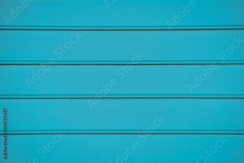 Background of turquoise wood paneling photo