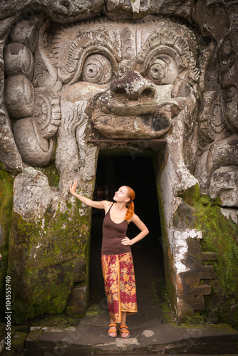 Young woman standing at Goa Gajah photo