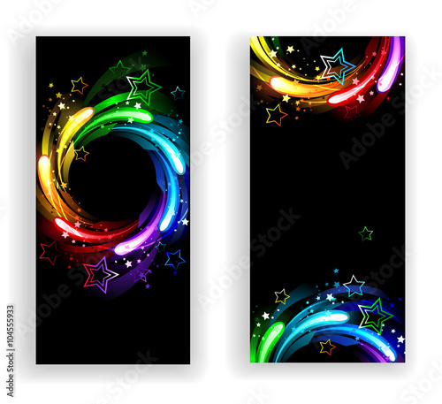 Two banners with rainbow stars