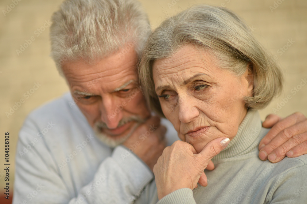 Mature couple near wall Mature couple near wall