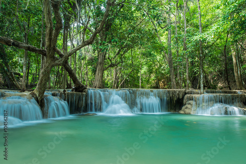  Green nature landscape with turquoise waterfall