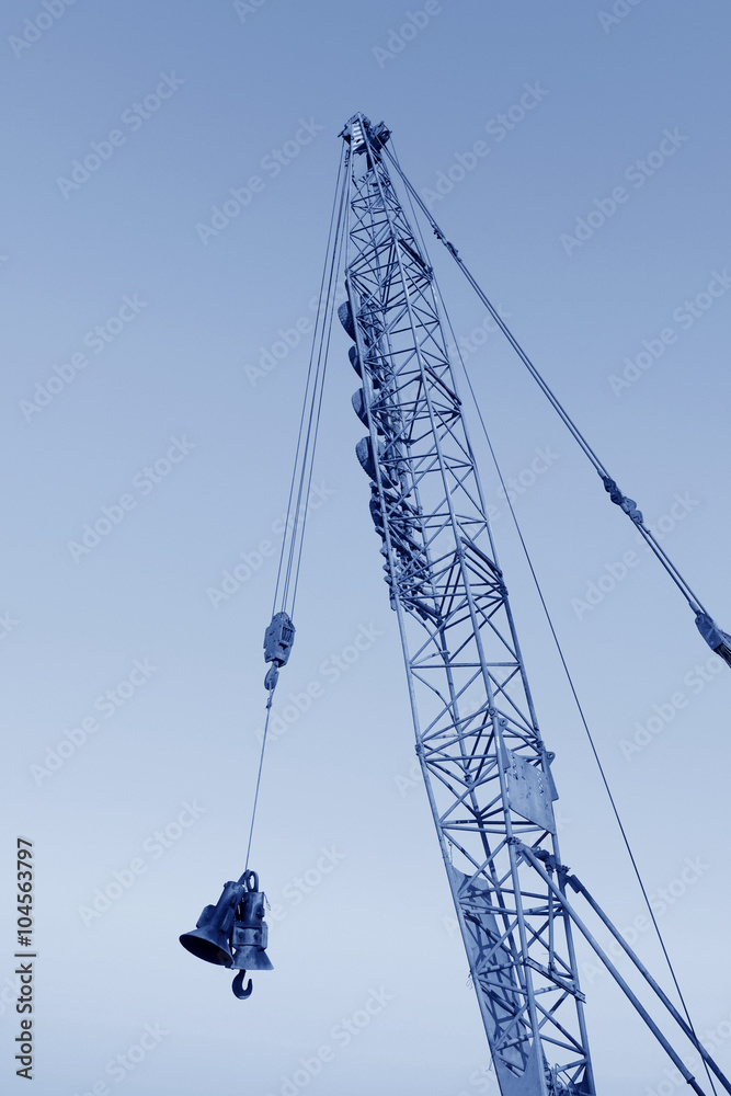 Crawler crane in the construction site Crawler crane in the construction site