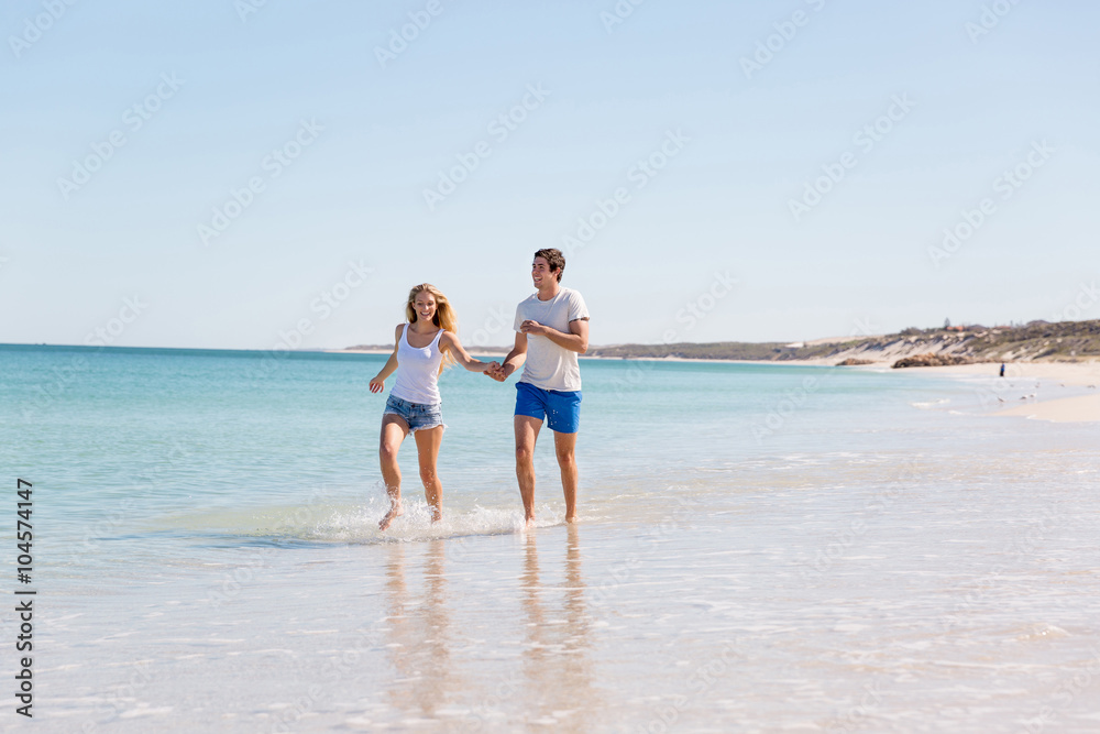 Romantic young couple on the beach