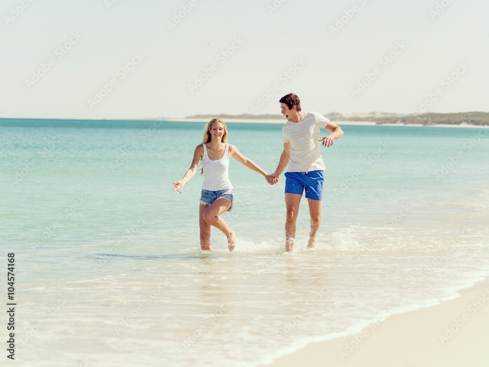 Romantic young couple on the beach