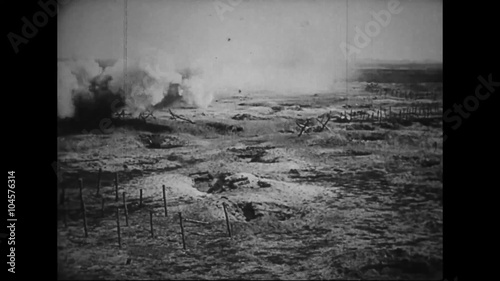 Captured German war film from World War One shows French and German troops fighting on a battlefield in 1916. photo