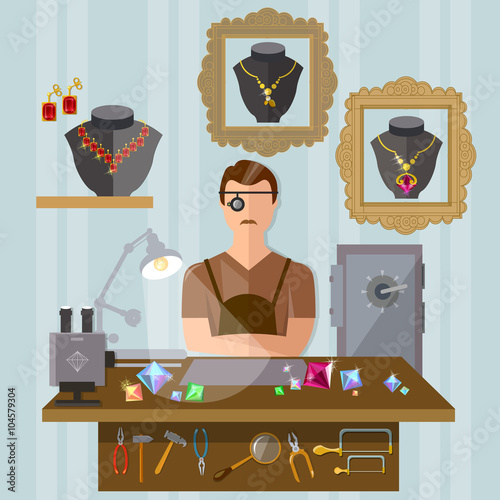 Jeweler at the workplace making jewelry