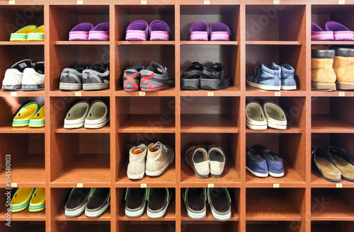 shelf of shoes., old shoe on rack