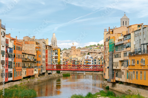 Girona. Multi-colored facades of houses on the river Onyar. © pillerss