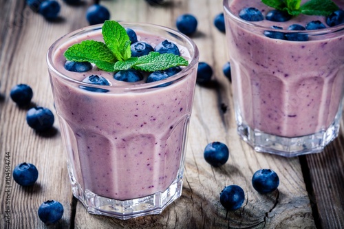 Fototapeta Blueberry smoothie in a glass