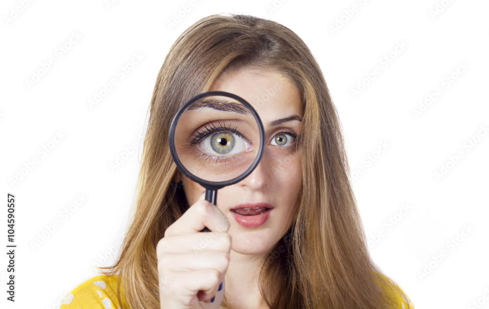 woman with magnifying glass isolated on a white background woman with magnifying glass isolated on a white background