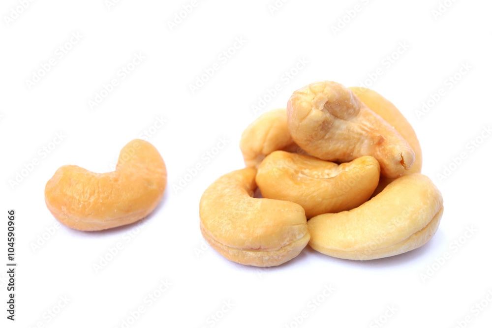 Peeled salted cashews isolated on a white background Peeled salted cashews isolated on a white background
