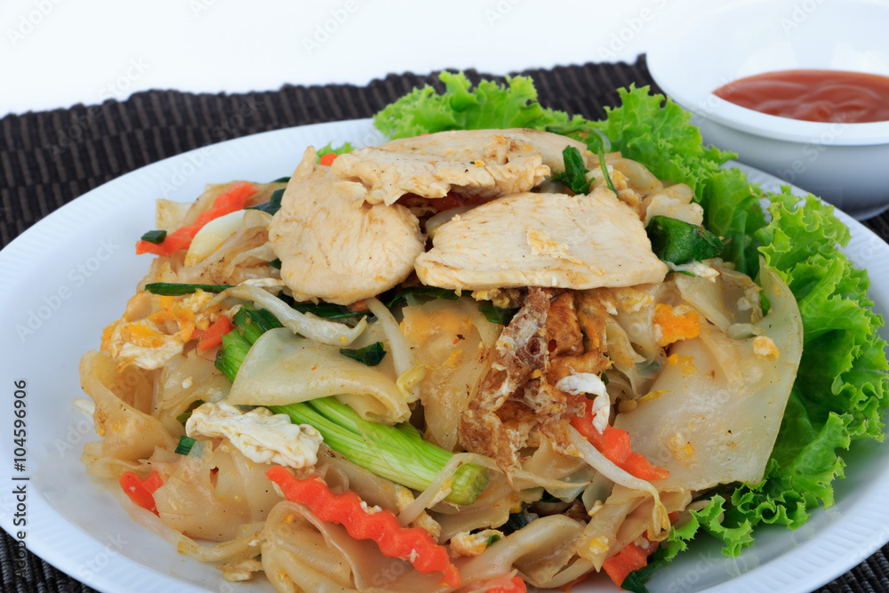 Rice Noodles Stir-fried with Chicken (Guay Tiew Kua Gai), Thai Street Food. Rice Noodles Stir-fried with Chicken (Guay Tiew Kua Gai), Thai Street Food.