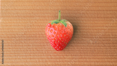 Strawberry on wood background