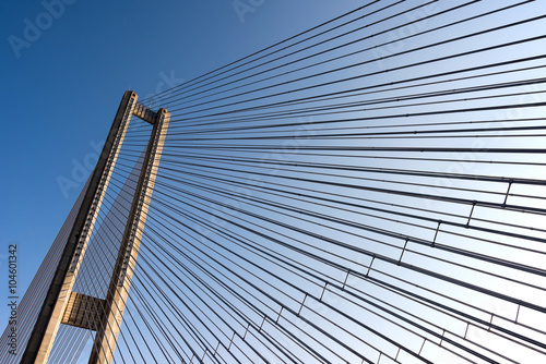 bridge steel ropes constructions on sky  background